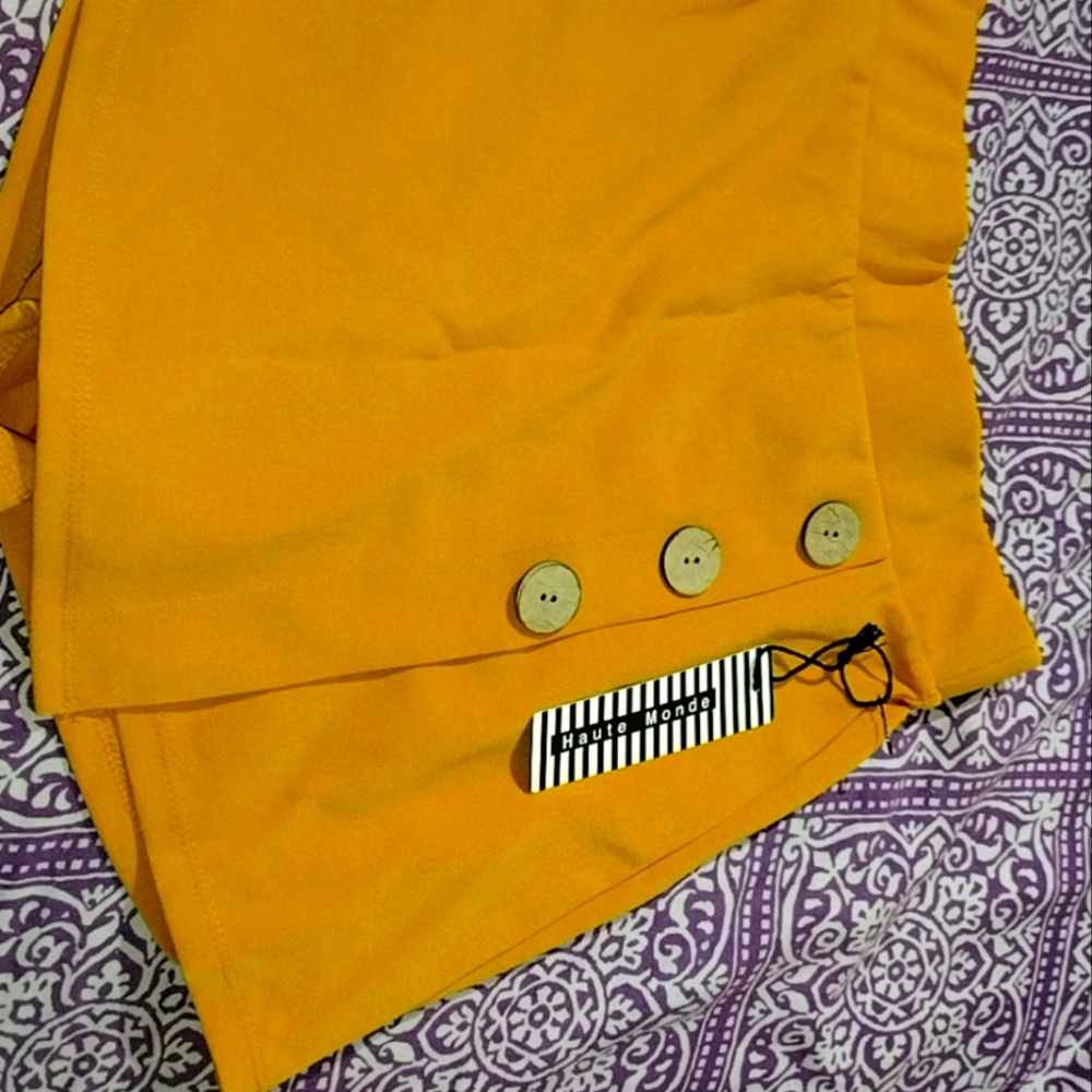 yellow shorts with skirt front cover